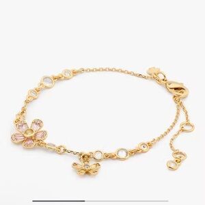 Kate Spade Gold Bracelet with Pink and White Accents